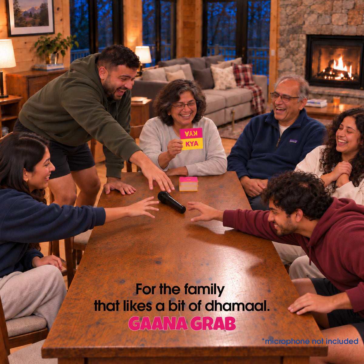Family playing Gaana Grab around a table as the host reveals a word card; microphone not included