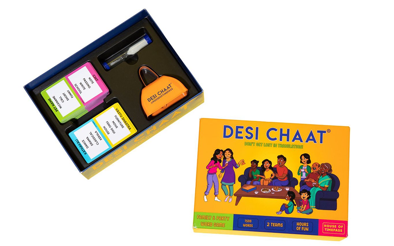Desi Chaat box open showing the card tray and sand timer inside, next to the closed box