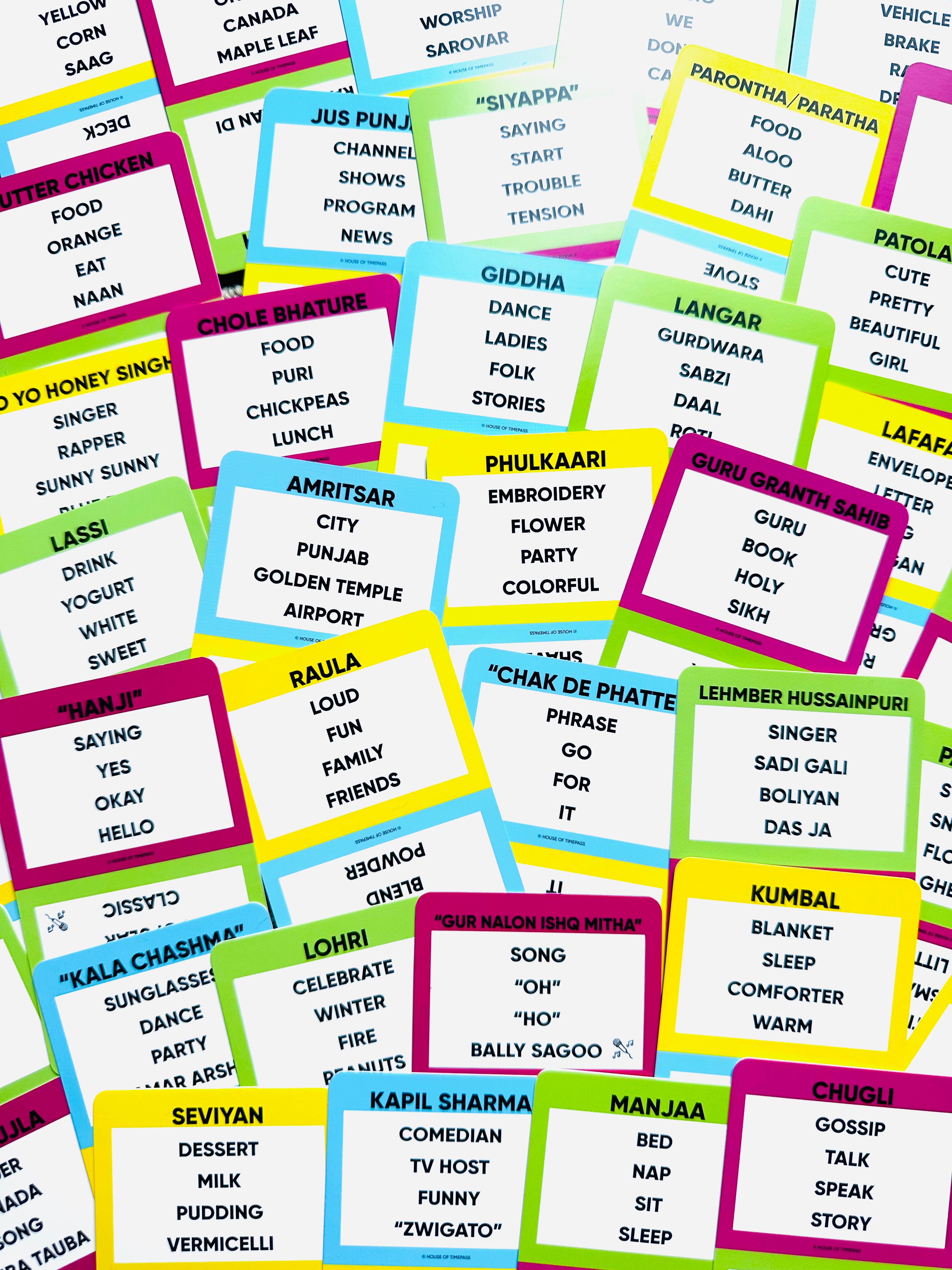 Punjabi Pack cards spread out showing Punjabi words and phrases to guess